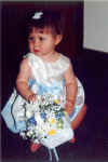 Anna_as_flower_girl.jpg (61790 bytes)